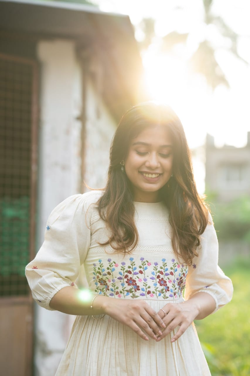 Off-white cotton dress with floral embroidery kurti