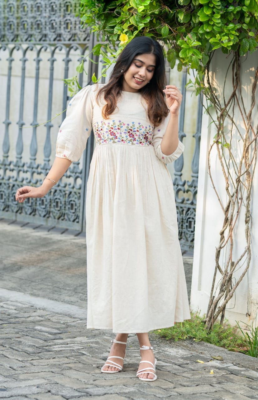 Off-white cotton dress with floral embroidery kurti