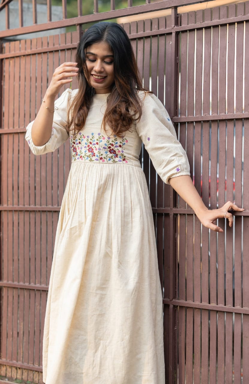 Off-white cotton dress with floral embroidery kurti